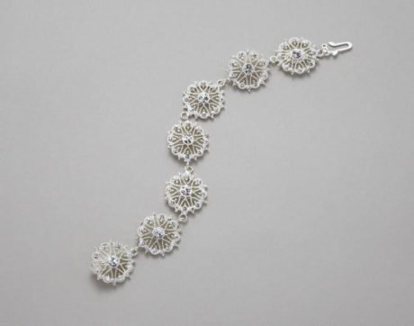 The Lace Band Crystal Bracelet by Elizabeth Bower is absolutely stunning. Featuring Swarovski elements with crystals and silver plating, this bracelet is the perfect way to add a bit of glam to your big day. This brand new headpiece is available to try on at The Barefaced Bride studio.