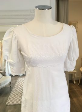 'Daffie' is a beautiful vintage gown is from the 1960s. A tiered cotton embroidered dress in size 6 - 8 $575. This vintage dress is available to try on at The Barefaced Bride studio.